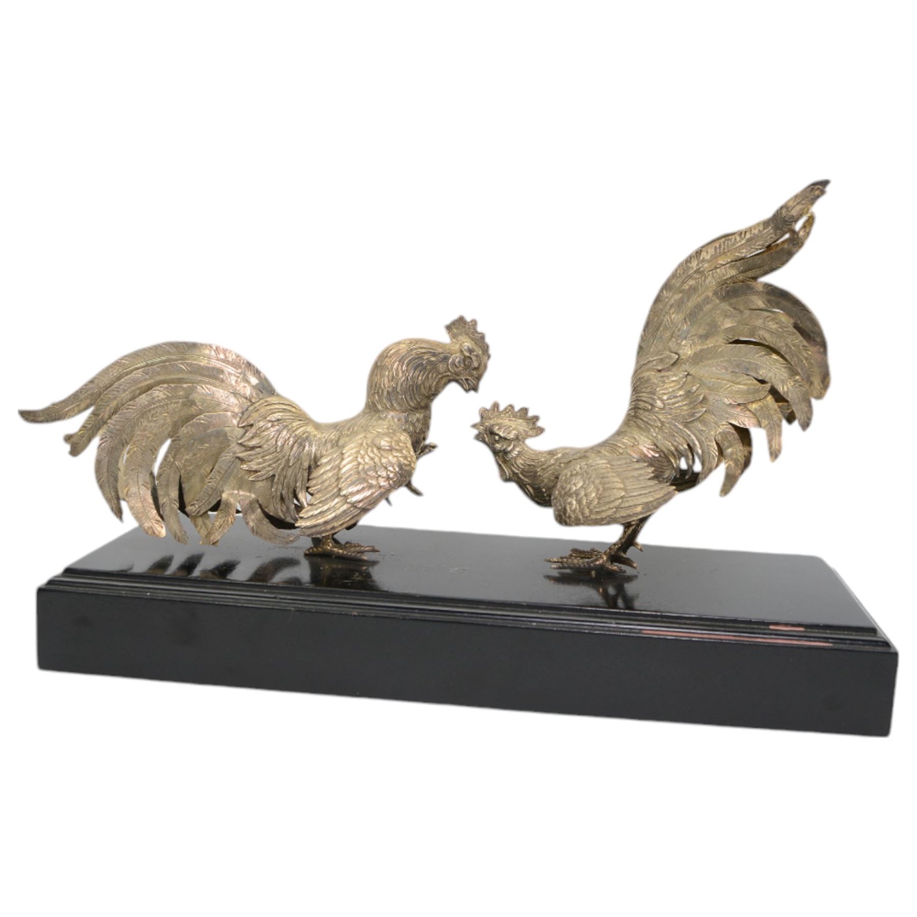 'The Northern Goldsmiths Sweepstakes 1975, Winner Aviator, Owner Guy Reed, Trainer Sam Hall' - A silver trophy modelled as two fighting cockerels on an ebonised plinth with plaque H24cm x W38cm import mark and makers mark for Israel Freeman & Son