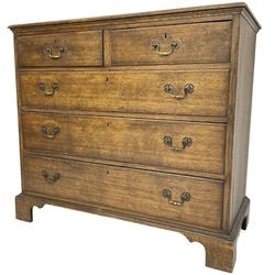 Early 20th century Georgian design oak chest, fitted with two short over three long drawers, lower moulded edge over bracket feet