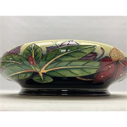 Large Moorcroft bowl decorated in Simeon pattern, designed by Philip Gibson, with impressed marks beneath, in original box, D44cm