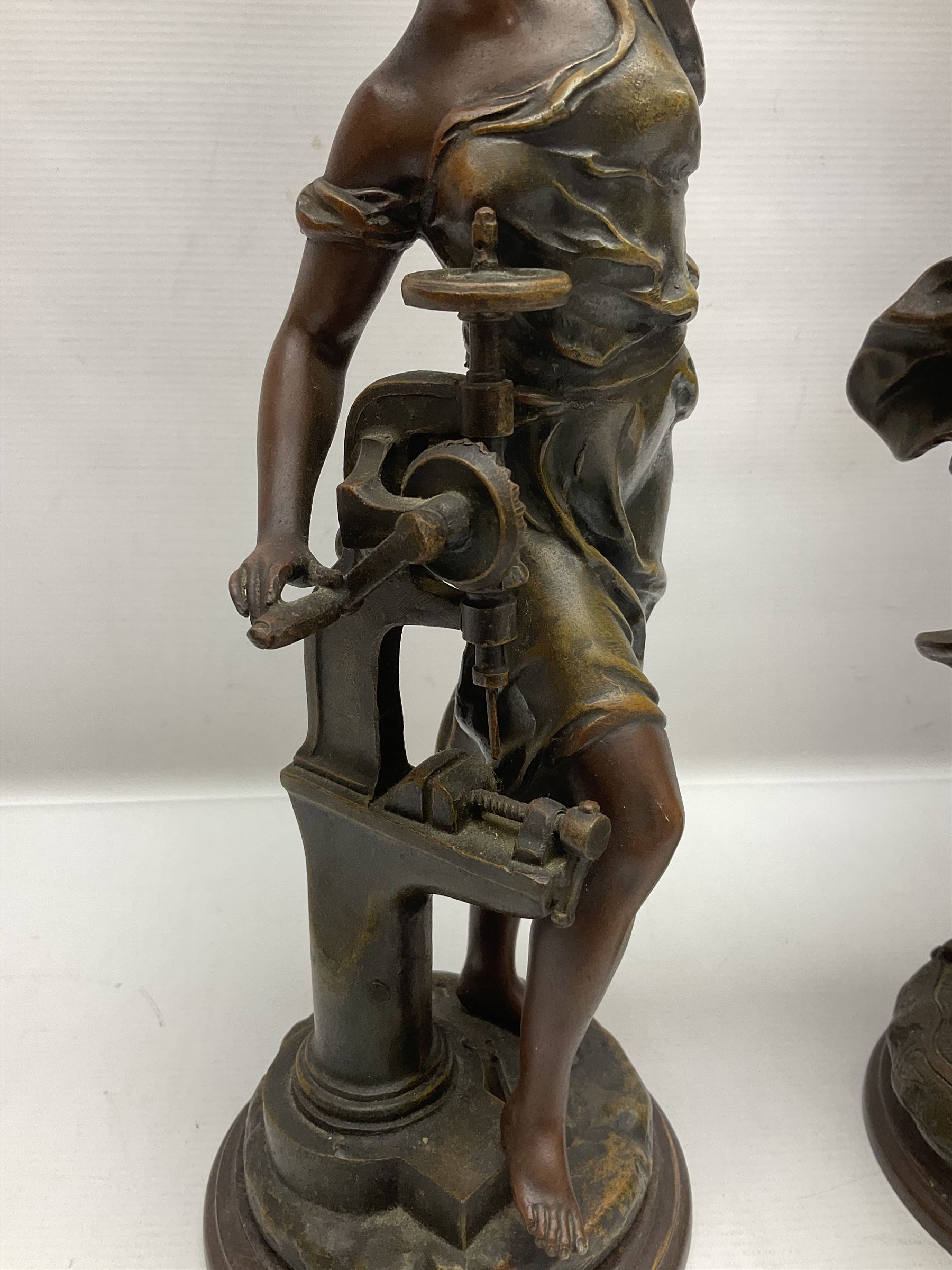 After Charles Octave Levy, pair of bronzed spelter figures, 'Industrie' and 'Commerce', upon stepped wooden plinth, H42cm