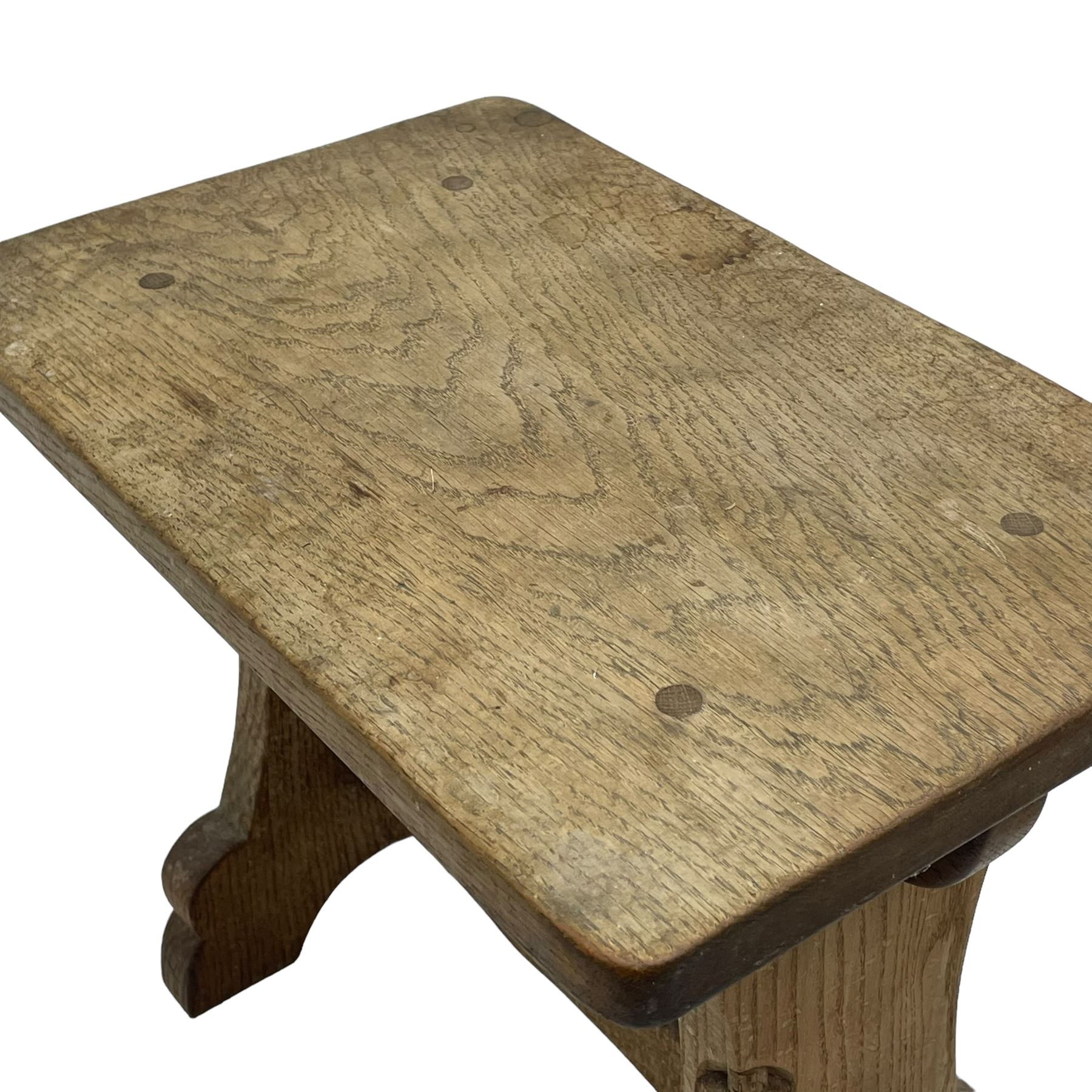 Gnomeman - three oak occasional tables, rectangular adzed top on shaped end supports united by pegged stretcher, each carved with gnome signature, by Thomas Whittaker, Littlebeck, the largest - 46cm x 29cm, H37cm