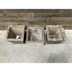 Pair of square cast stone planters, single planter with leaf decoration and a rectangular brick effect planter (4)