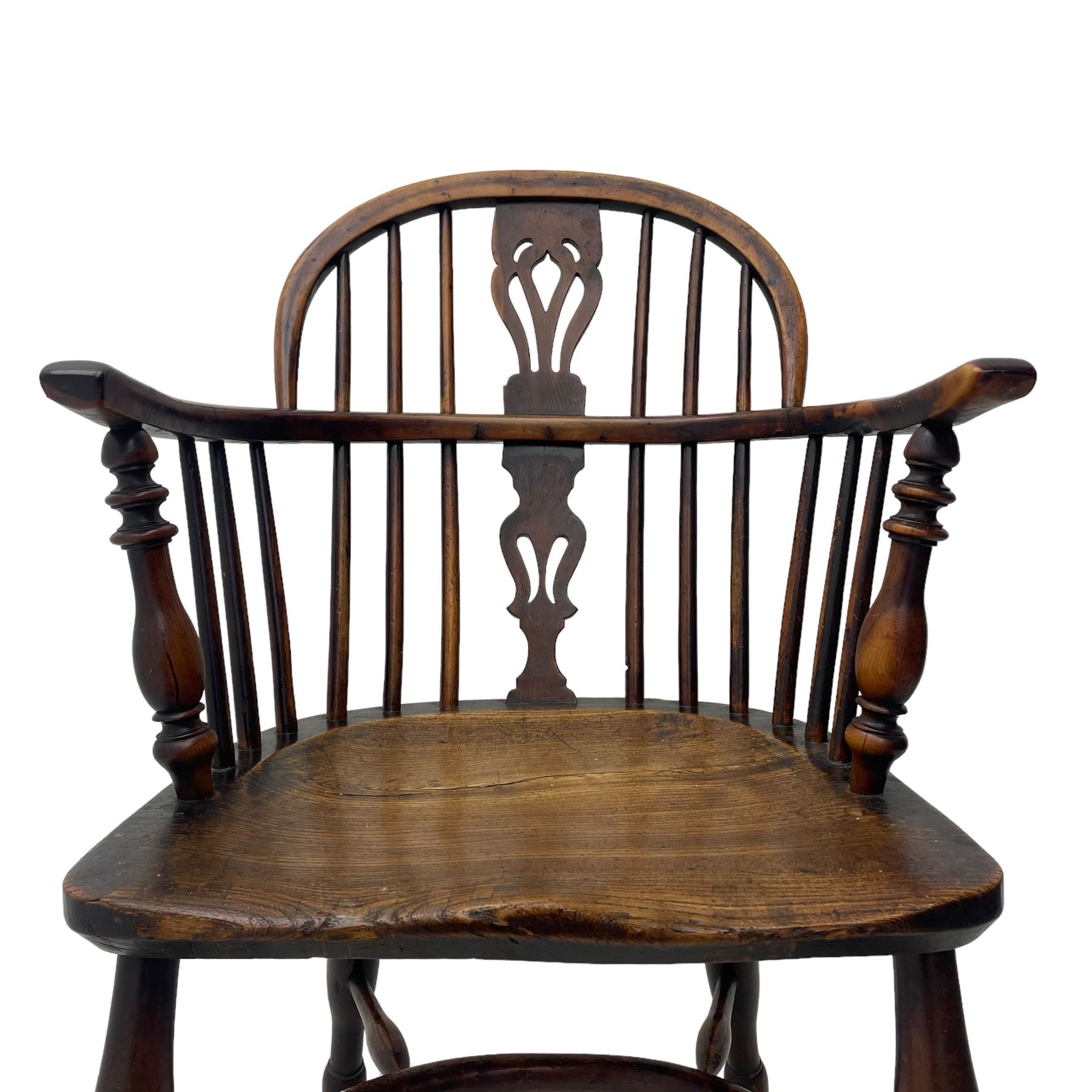 19th century yew wood and elm Windsor armchair, low double hoop stick and pierced splat back, dished seat on turned supports united by crinoline stretchers