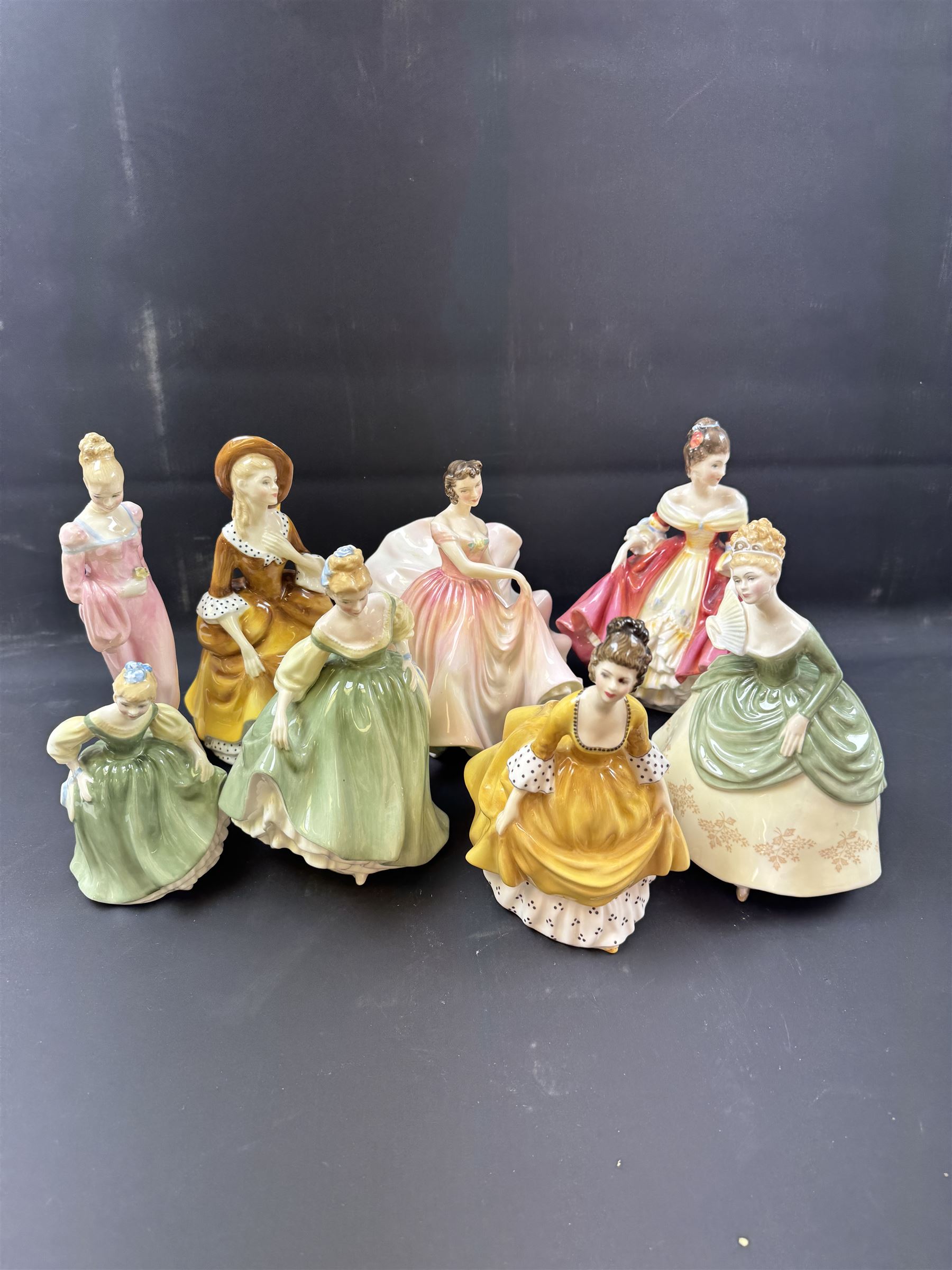 Eight Royal Doulton figures, including Southern Belle, Soiree, Sandra etc 