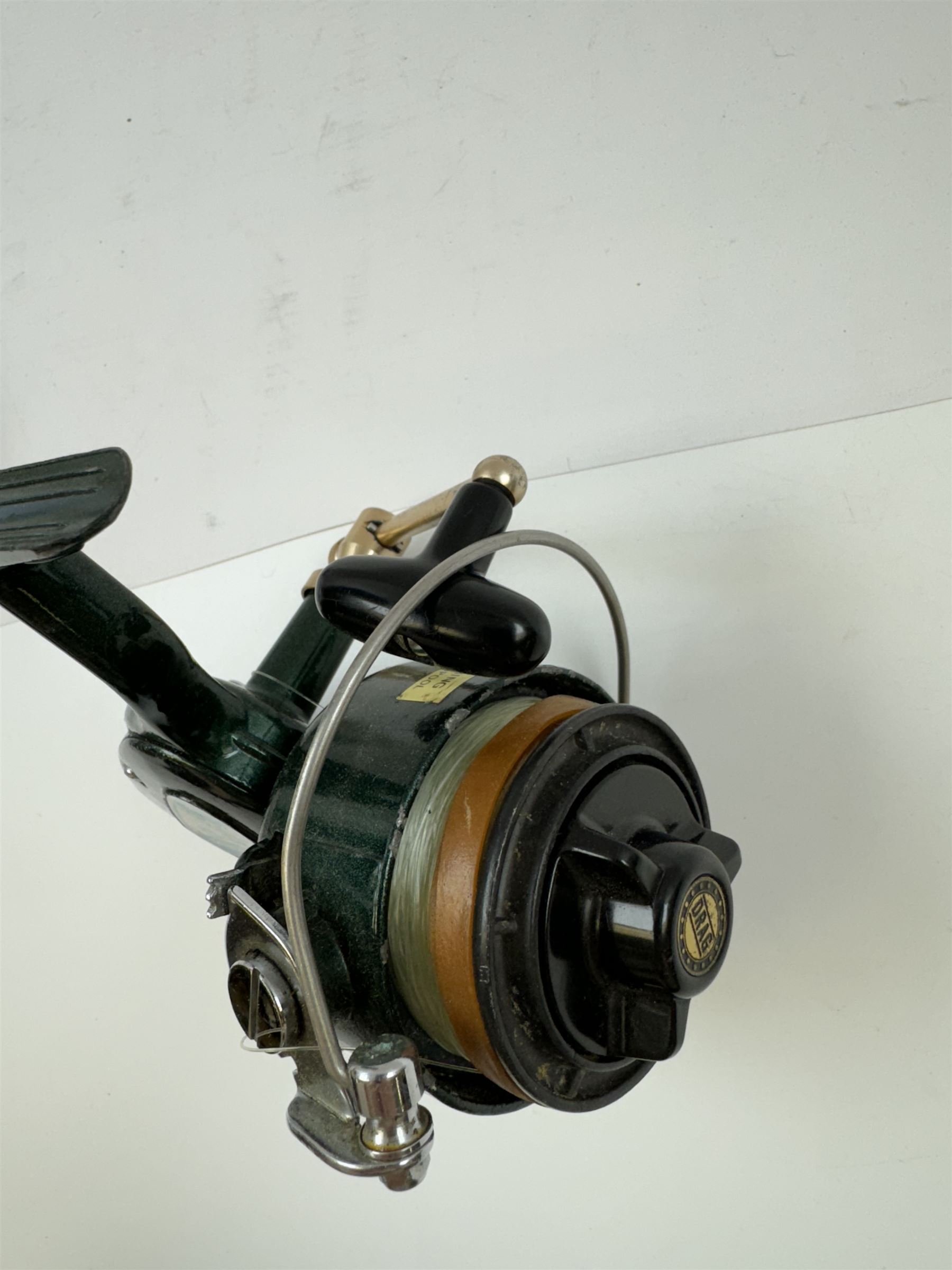 Four fishing reels, Winfield Beach fisher rod, Winfield International 20 , DAM International etc 