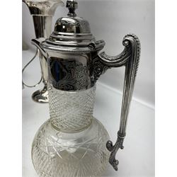 Silver plated three branch epergne, together with a silver plated cut glass claret jug, and silver plated embossed swing handled basket, epergne H30.5cm