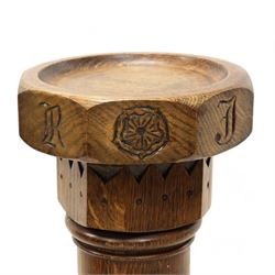 Early 20th century carved oak ecclesiastical baptismal font, circular dished top with hexagonal edge carved with Yorkshire rose and lettering, turned pedestal with acanthus carved decoration, on square base with ogee feet