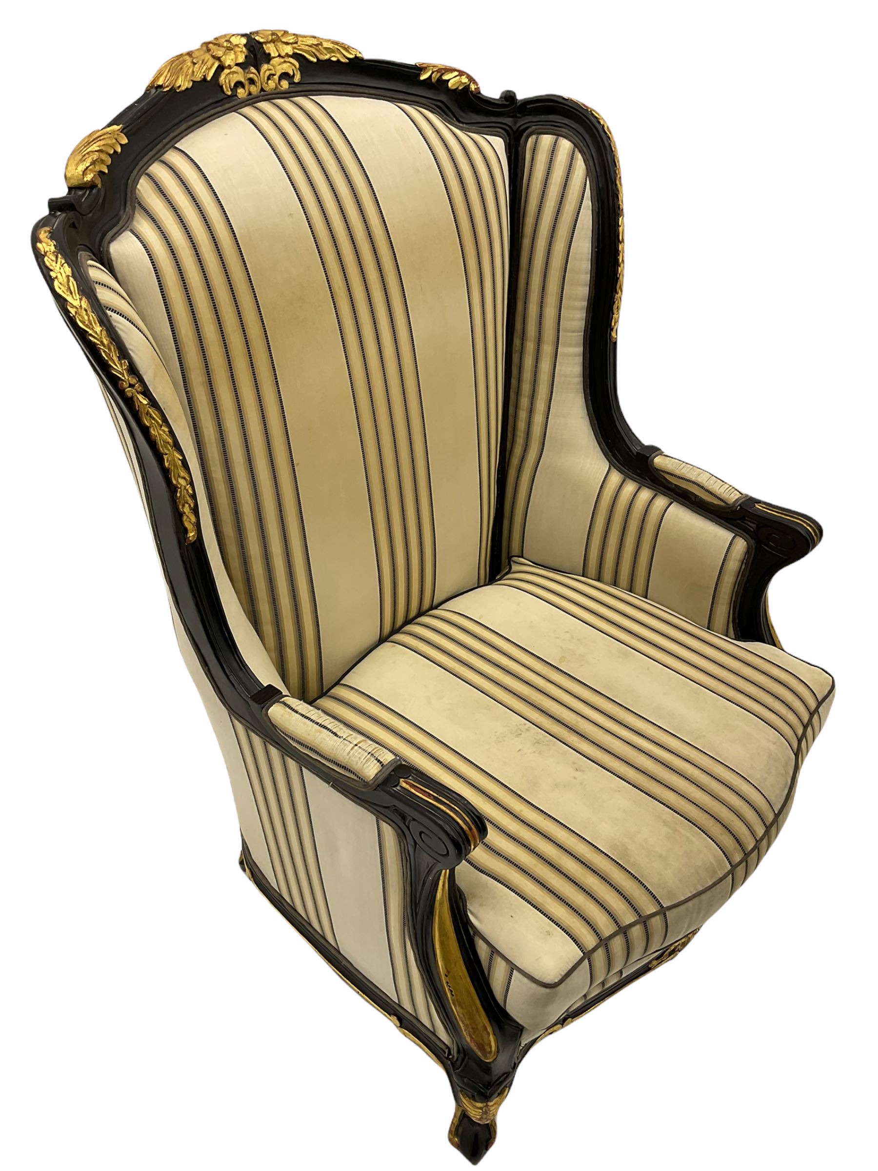 Thomas Messel design classical ebonised and gilded wing back chair