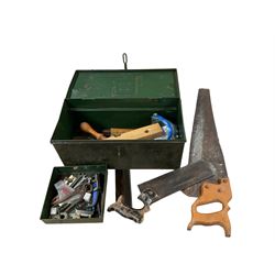 Green tin box of tools, including saws, spanners etc