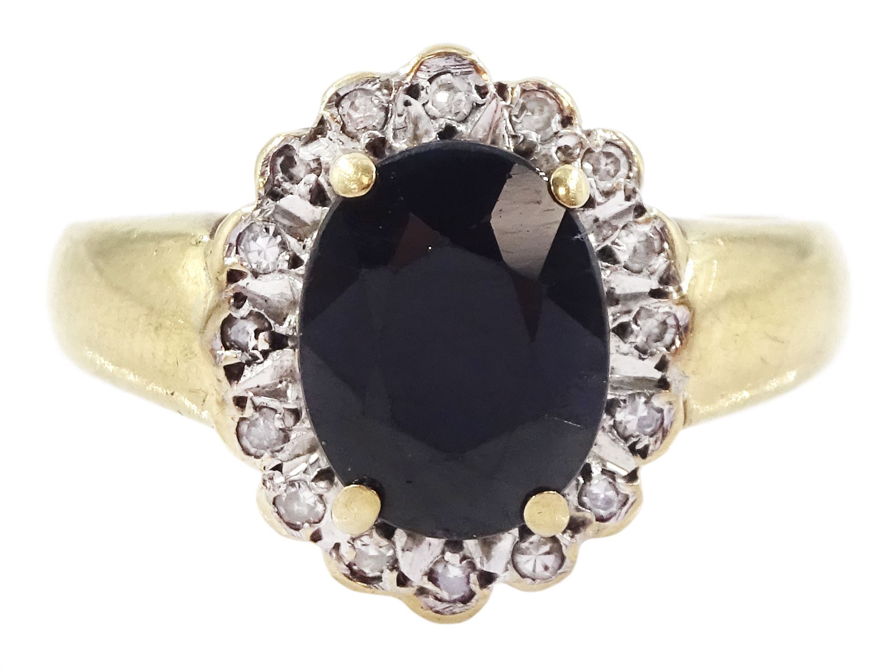 9ct gold oval cut sapphire and round brilliant cut diamond cluster ring, hallmarked