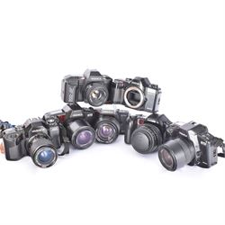 Seven Yashica SLR cameras, comprising two 270 Auto Focus camera bodies serial nos. 016343 & 014624, a 300 Auto Focus serial no. 013055, each with Yashica AF 28-70mm 1:3.5-4.5 lenses, 200 AF camera body serial no. 412426, with an AF 50mm 1:18 lens, 230 AF camera body serial no. 0172124, with an AF 35-105mm 1:3.5-4.5 Macro lens, 107 Multi Program serial no. 5042008, with a MC Zoom 35-70mm 1:3.5-4.5 lens and a 108 Multi Program camera body serial no. 5016848