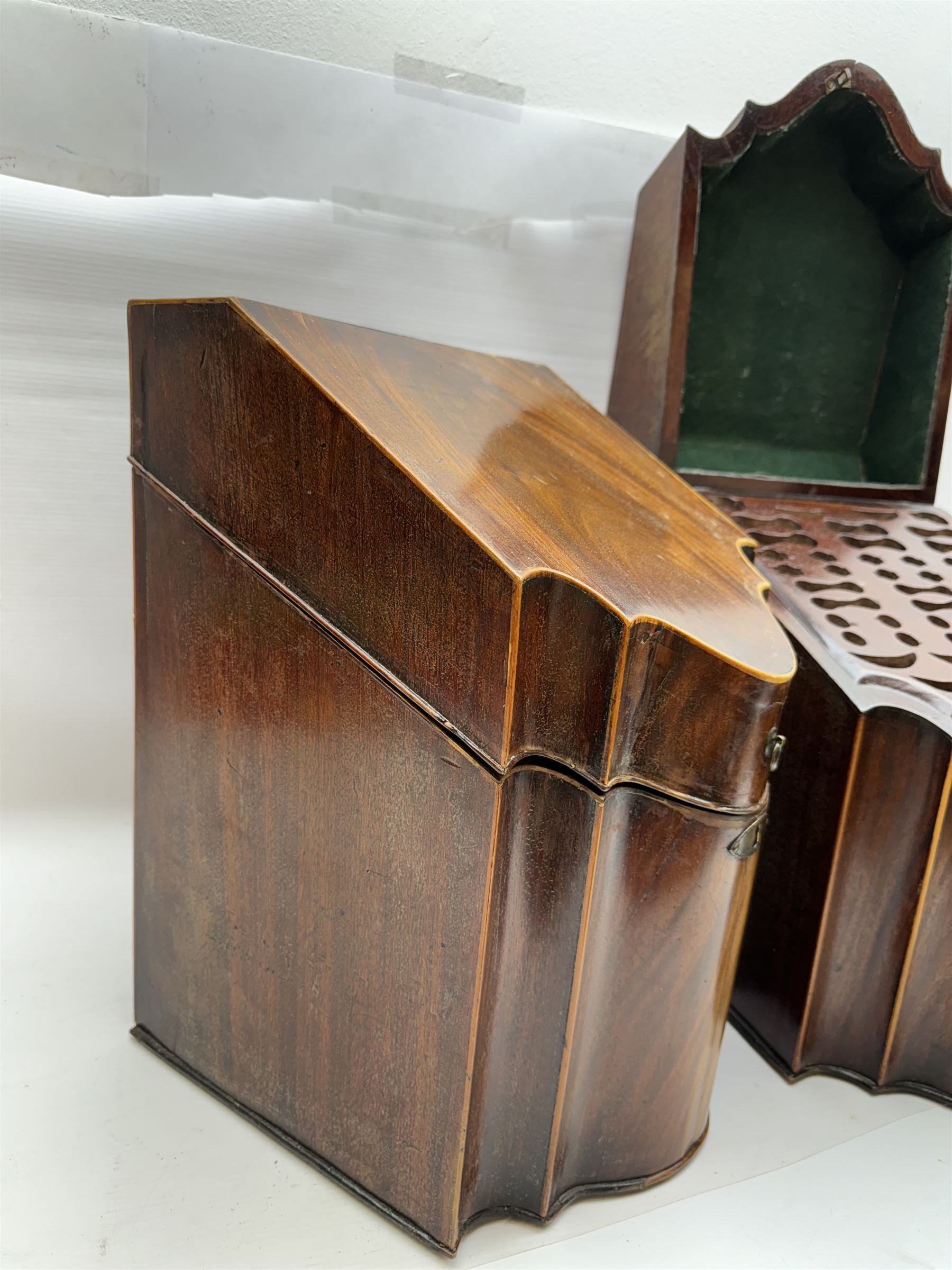 Pair of George III mahogany knife boxes, each of serpentine fronted form with strung detail to the hinged cover and body, opening to reveal a fitted interior, H38cm