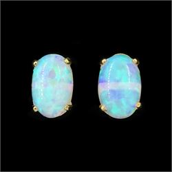 Pair of 9ct gold opal stud earrings, stamped