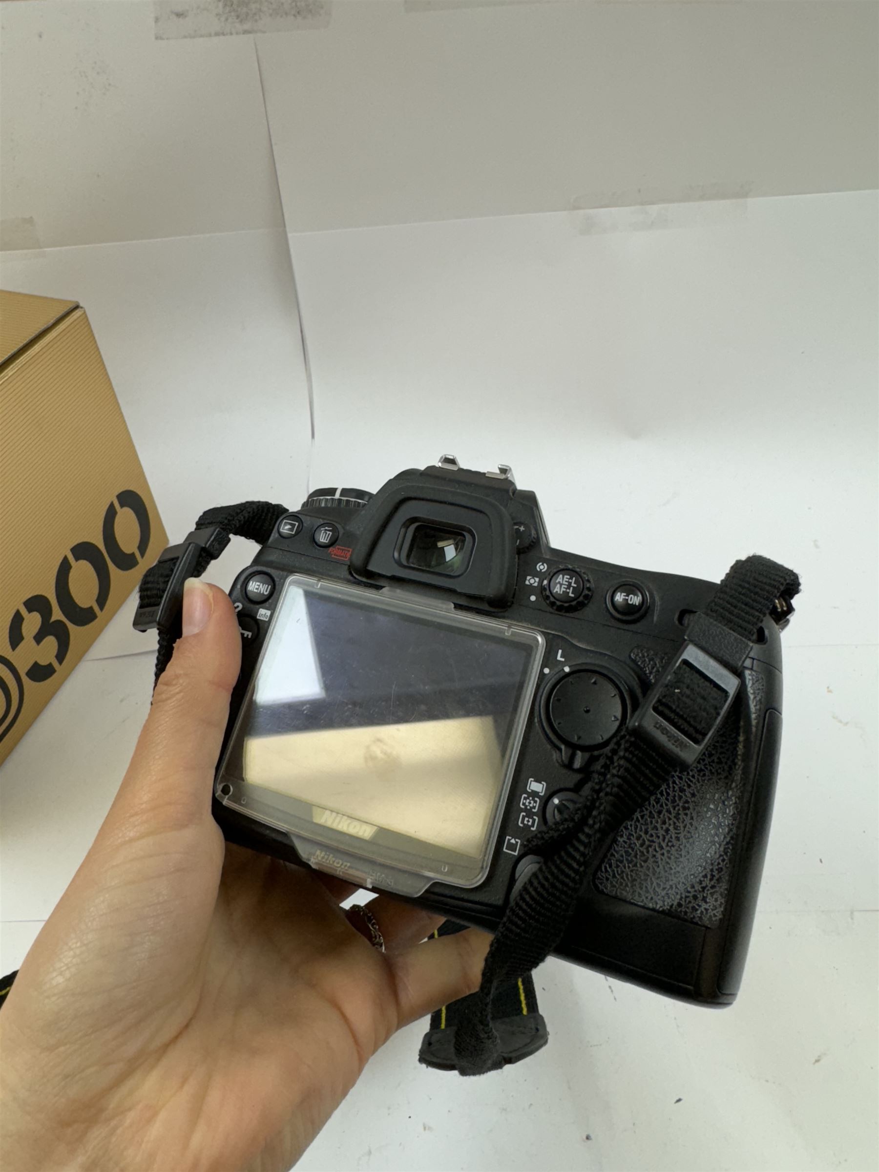 Nikon D300 camera body serial no. 4105777, boxed with shoulder strap, instructions, charger, etc