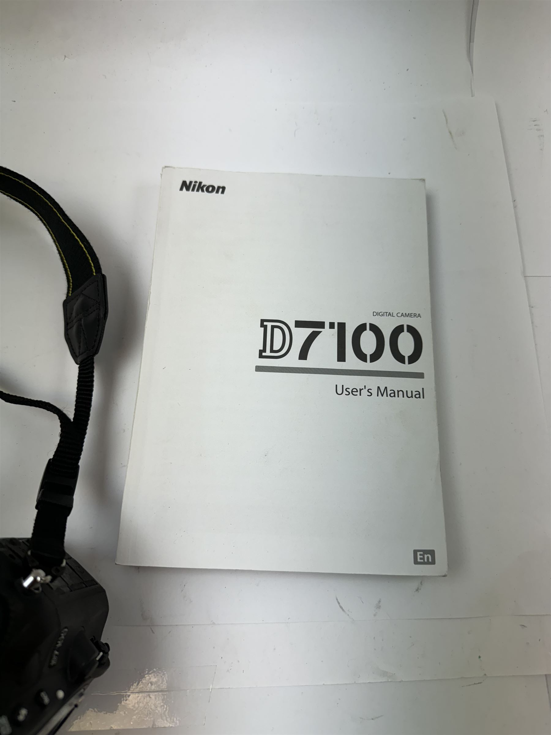 Nikon SLR D7100 camera body, serial no. 2126271, with instruction manual