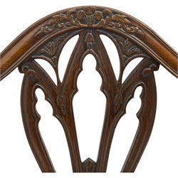 Early 19th century mahogany elbow chair, shaped cresting rail carved with foliate scrolls over Gothic pierced splat, upholstered drop-in seat, on square tapering moulded front supports united by stretchers (W51cm, H94cm); early 20th century walnut tub-shaped elbow chair, pierced splat back, upholstered seat on cabriole supports carved with ball and claw feet (W60cm, H84cm); George III mahogany side chair, shaped cresting rail over Hepplewhite design back, upholstered drop-in seat, on square tapering supports with H shaped stretchers (H945cm)