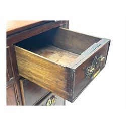 George III mahogany bureau, the fall-front enclosing fitted interior with pigeonholes and central cupboard, over an arrangement of nine short drawers surrounding a central cupboard, on shaped bracket feet