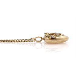 Early 20th century 9ct gold seed pearl and applied wirework heart pendant, on 10ct gold chain necklace