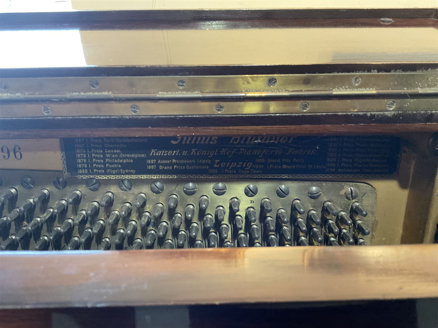 Bluthner of Leipzig - Early 20th century overstrung upright piano, serial number 79496 (1910), in a mahogany case with three front case panels and folding music desk, with 85 keys (seven octaves) underdamper action, original hammers, stringing, tuning pins, dampers and felts, with sostenuto and sustain pedals. Julius Bluthner was considered to be one of the the best makers of German upright pianos in the early 20th century both for tone quality and build. 

This item has been registered for sale under Section 10 of the APHA Ivory Act.