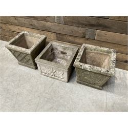 Pair of square cast stone planters, single planter with leaf decoration and a rectangular brick effect planter (4)