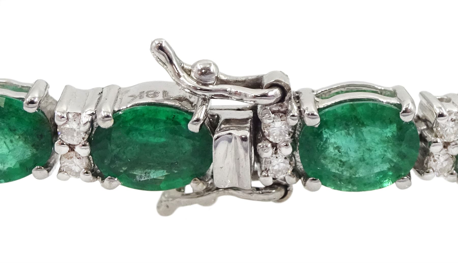 18ct white gold oval cut emerald and round brilliant cut diamond bracelet, stamped, total emerald weight 7.50 carat, diamond weight 0.46 carat