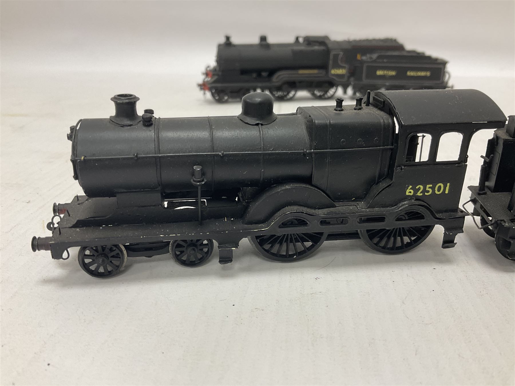 ‘00’ gauge - four kit built steam locomotives and tenders comprising LNWR Experiment Class ‘Stephenson’ 4-6-0 no.2052 finished in LMS black; Class D10 ‘Sir Edward Fraser’ 4-4-0 no.62653 finished in BR black; Class D14 4-4-0 no.62501 finished in BR black with LNER tender; Class E4 2-4-0 no.62786 finished in BR black (4) 