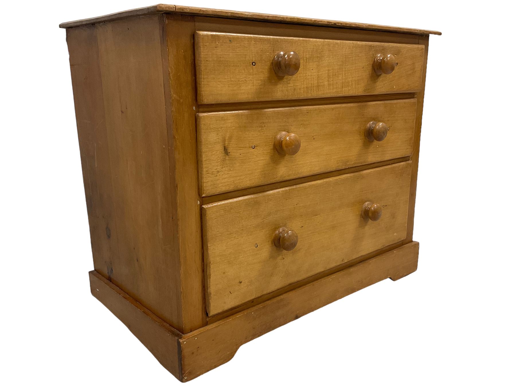 Victorian pine and satinwood chest, fitted with three graduating drawers, on skirted base with castors