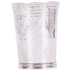 Commonwealth silver cup, of cylindrical form engraved with foliate band and motifs beneath slightly tapering rim, and stipple engraved with monogram 'MT', upon short banded foot, hallmarked Edward Treene, London 1657, H10.5cm D8cm