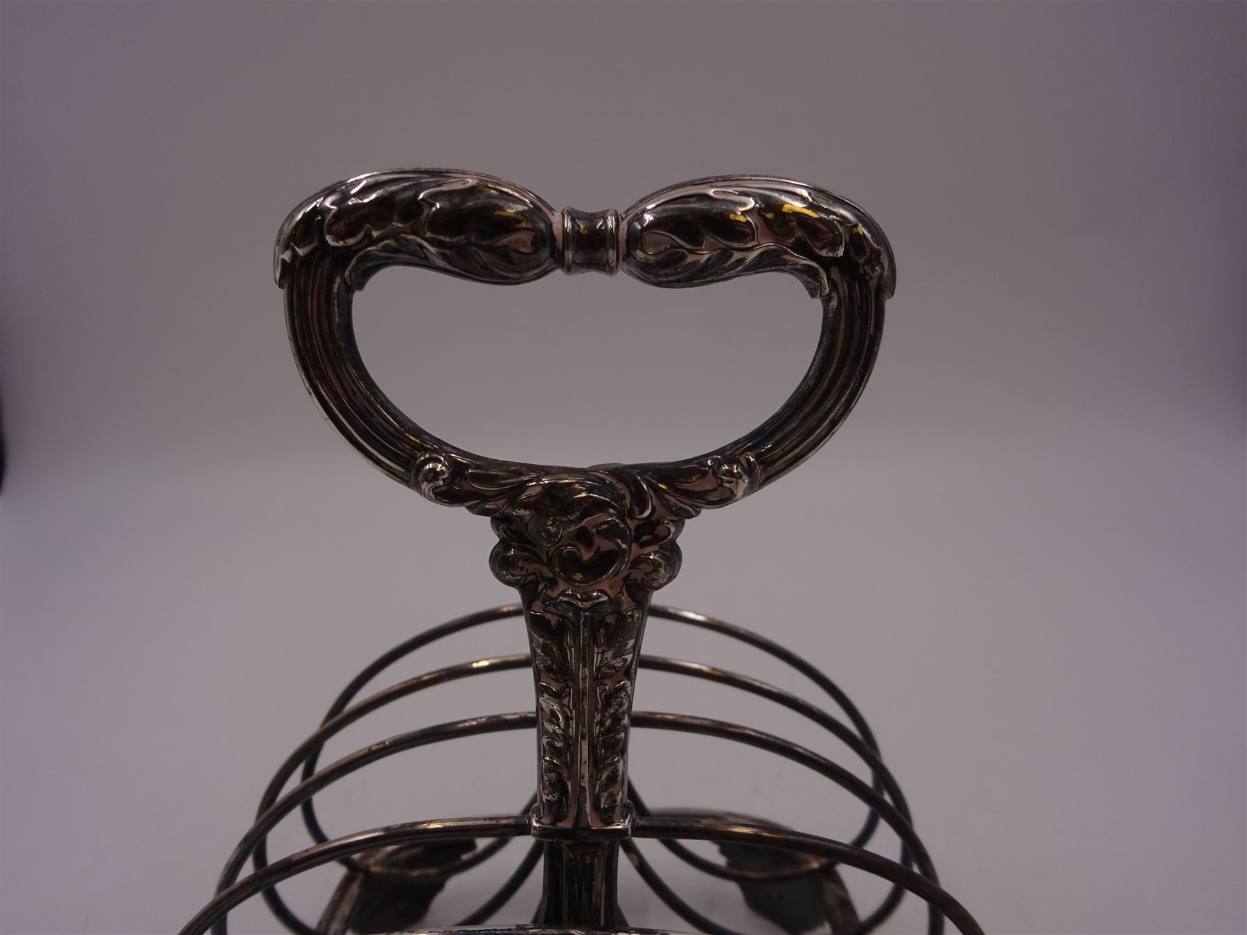 George III silver seven bar toast rack, with foliate mounted scroll feet and loop handle, hallmarked Matthew Boulton, Birmingham 1797, H15cm