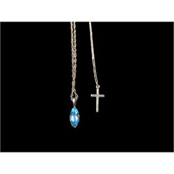 9ct gold navette shaped blue topaz pendant necklace and a 9ct gold cross pendant necklace,...