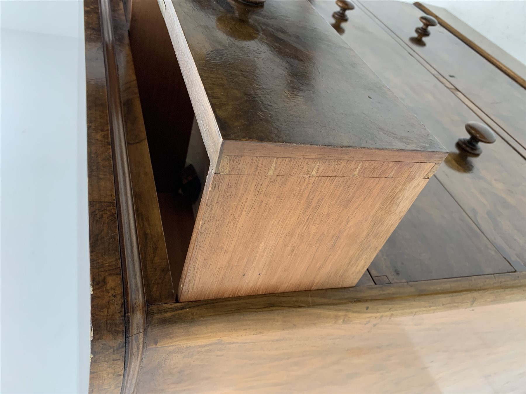 Victorian figured walnut chest, rectangular top with rounded corners above two short and three long drawers, plinth base, W107cm, H107cm, D54cm