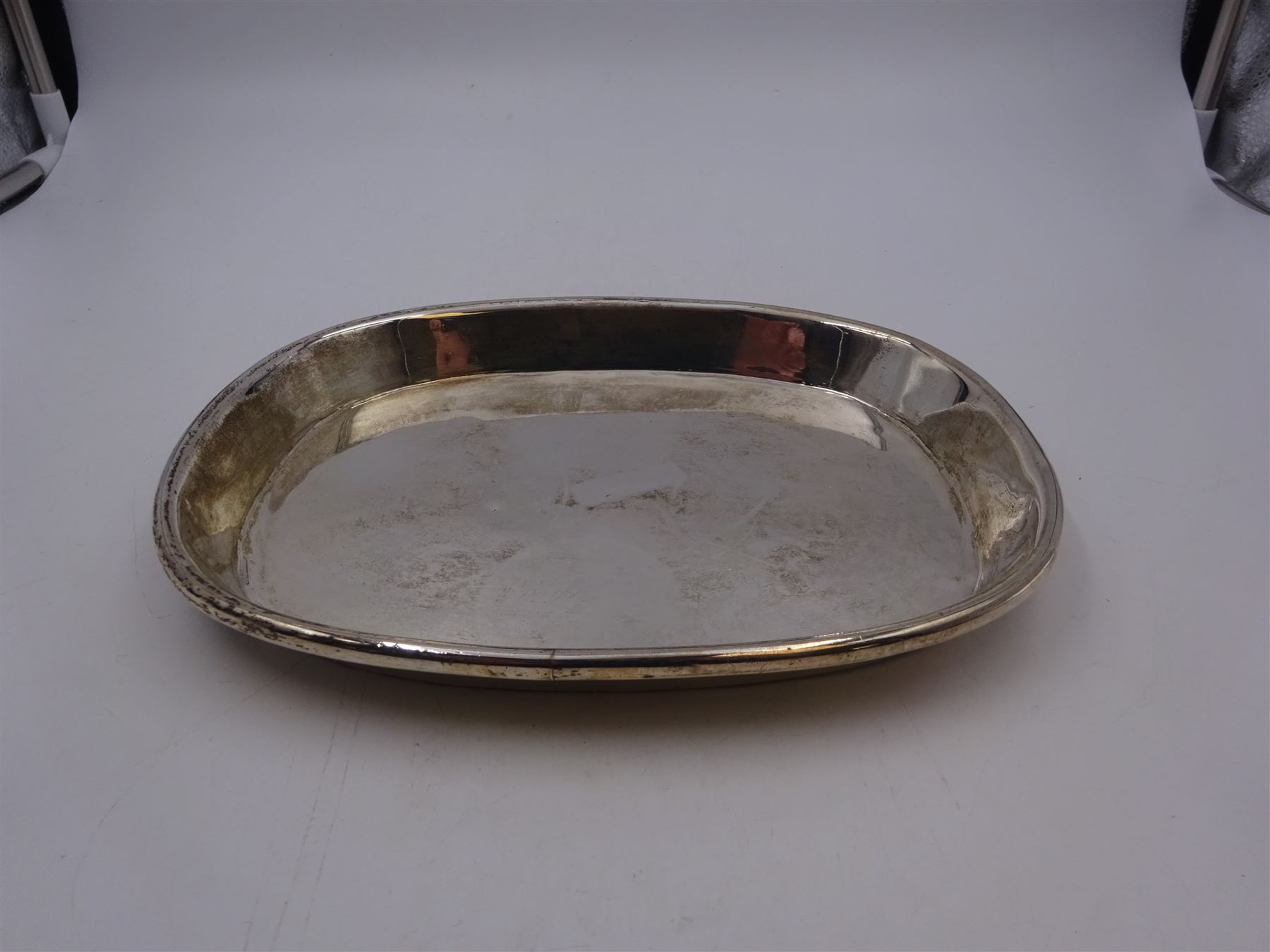 Mexican silver tray, of rectangular form with rounded corners and rolled rim, stamped Mexico 925, L22.5cm, W18cm