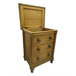 19th century stripped pine pedestal chest, hinged rectangular top with three planks and rounded edges, over three simulated drawer fronts with turned knobs, on turned baluster feet