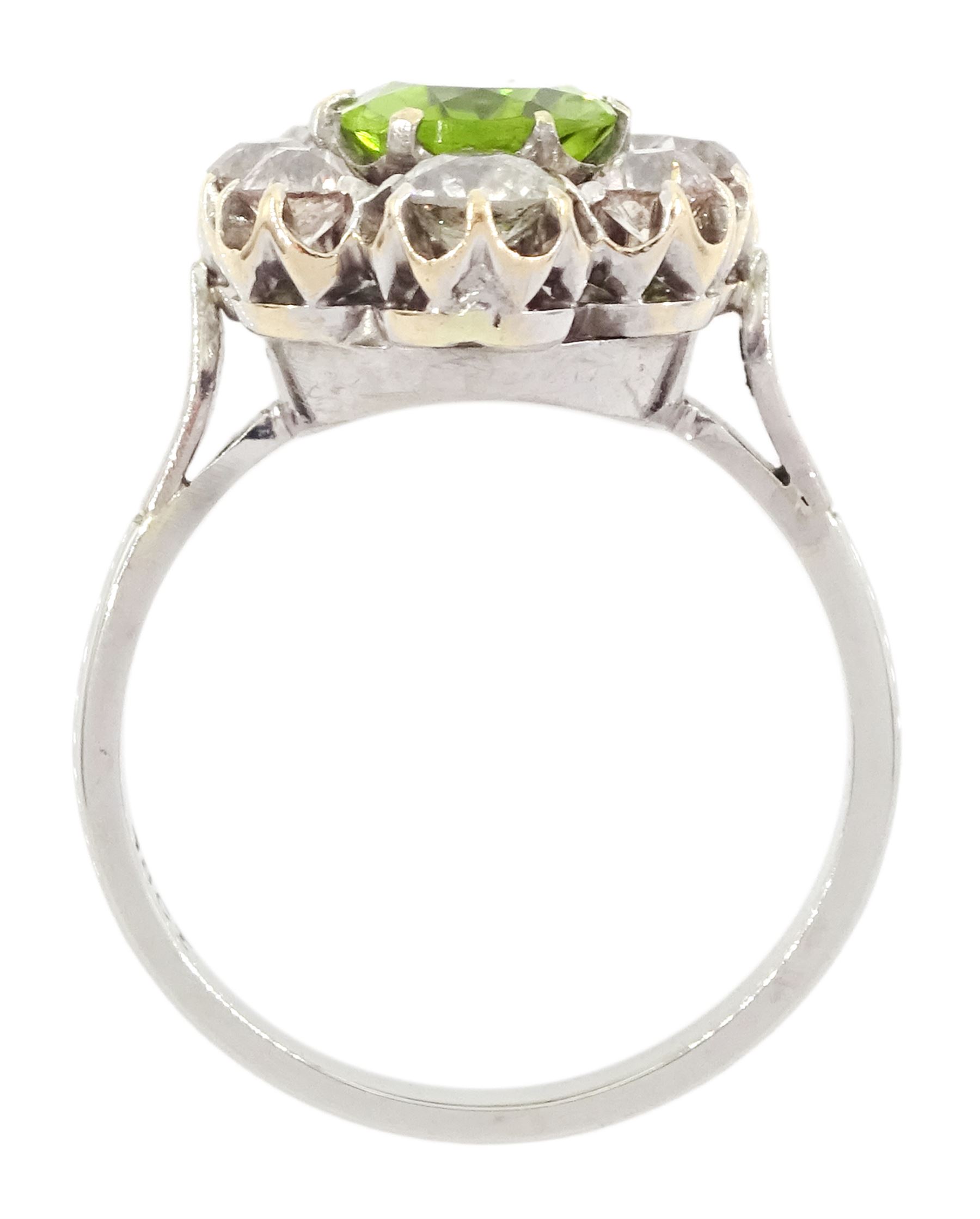 18ct white gold oval cut peridot and old cut diamond cluster ring, stamped 18ct, total diamond weight approx 1.20 carat