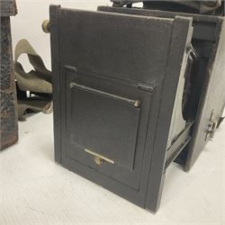 Early 20th century Adams and Co 'Videx' folding plate camera, in original leather carrying case, with various quarter plates