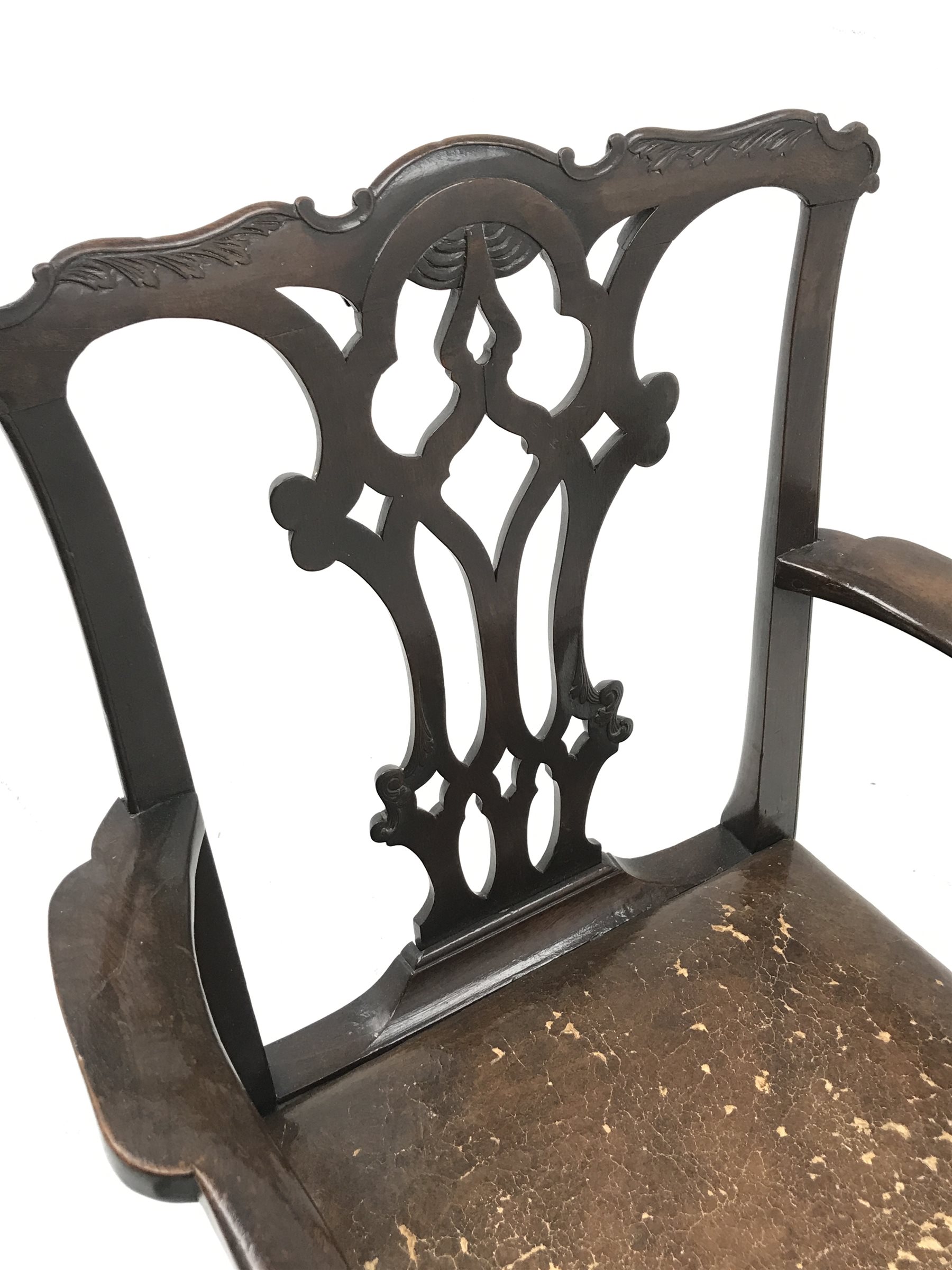 Georgian mahogany armchair, shaped cresting rail over a Gothic pierced splat, arms with acanthus scrolled terminals, leather drop in seat, moulded square supports, W62cm (total)