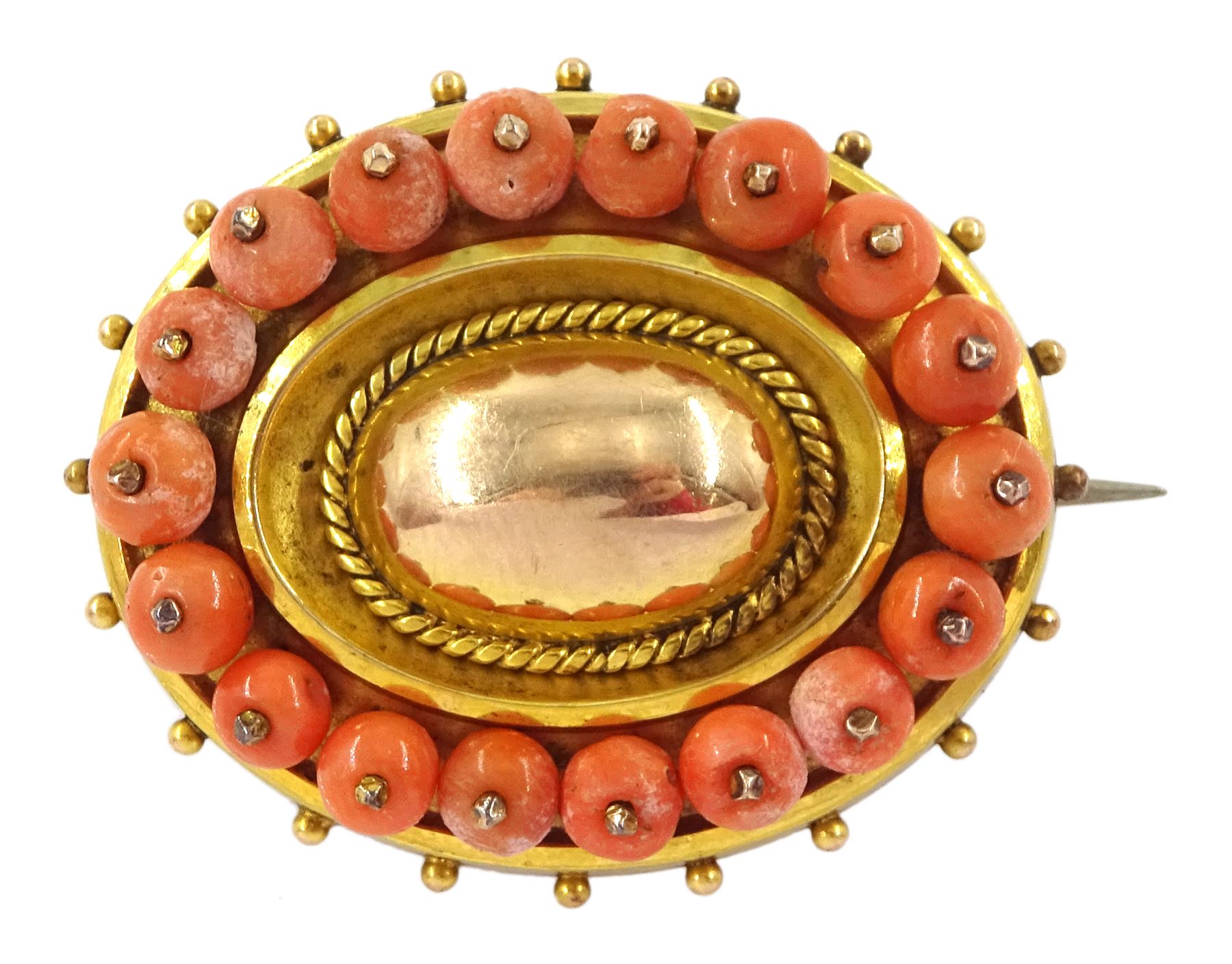 Victorian 9ct gold coral brooch, with glazed locket back