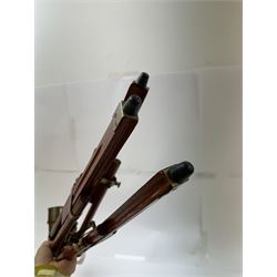 Brass telescope upon a wooden adjustable tripod, H55cm 