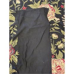 Embroidered Karandi fabric runner, the field featuring a black ground with an all-over floral design, including large pink and cream roses, accompanied by green leaves and small blossoms, bordered by plain sections at each end