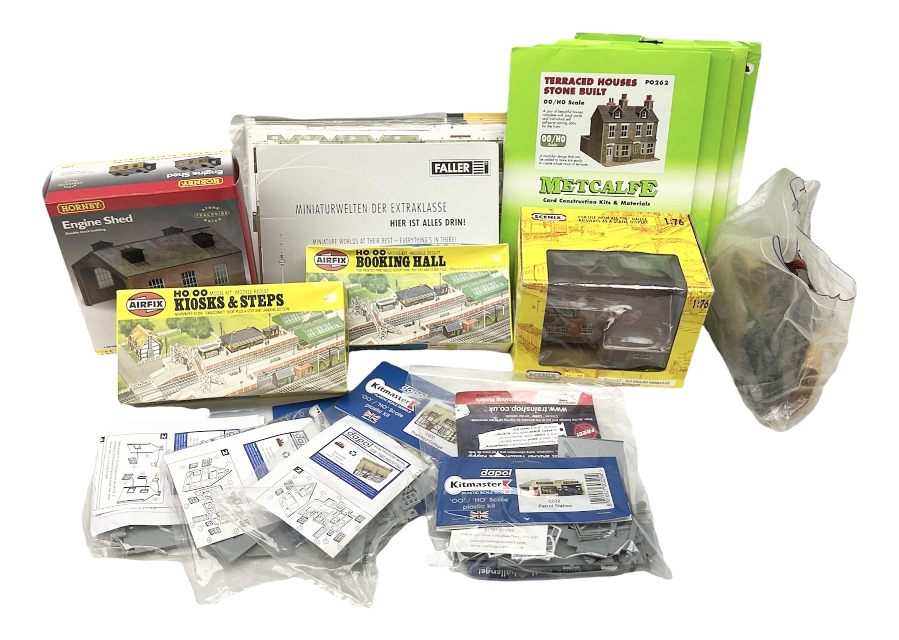 '00' gauge - quantity of trackside buildings kits by Metcalfe Superquick, Faller, Airfix, Dapol, Hornby etc in original packaging; and Scenix Old English Farmhouse building; boxed