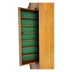 Younger - mid-20th century teak sideboard, rectangular top over three central drawers with recessed handles, flanked by two cupboard doors enclosing two shelves, on tapered supports joined by stretchers