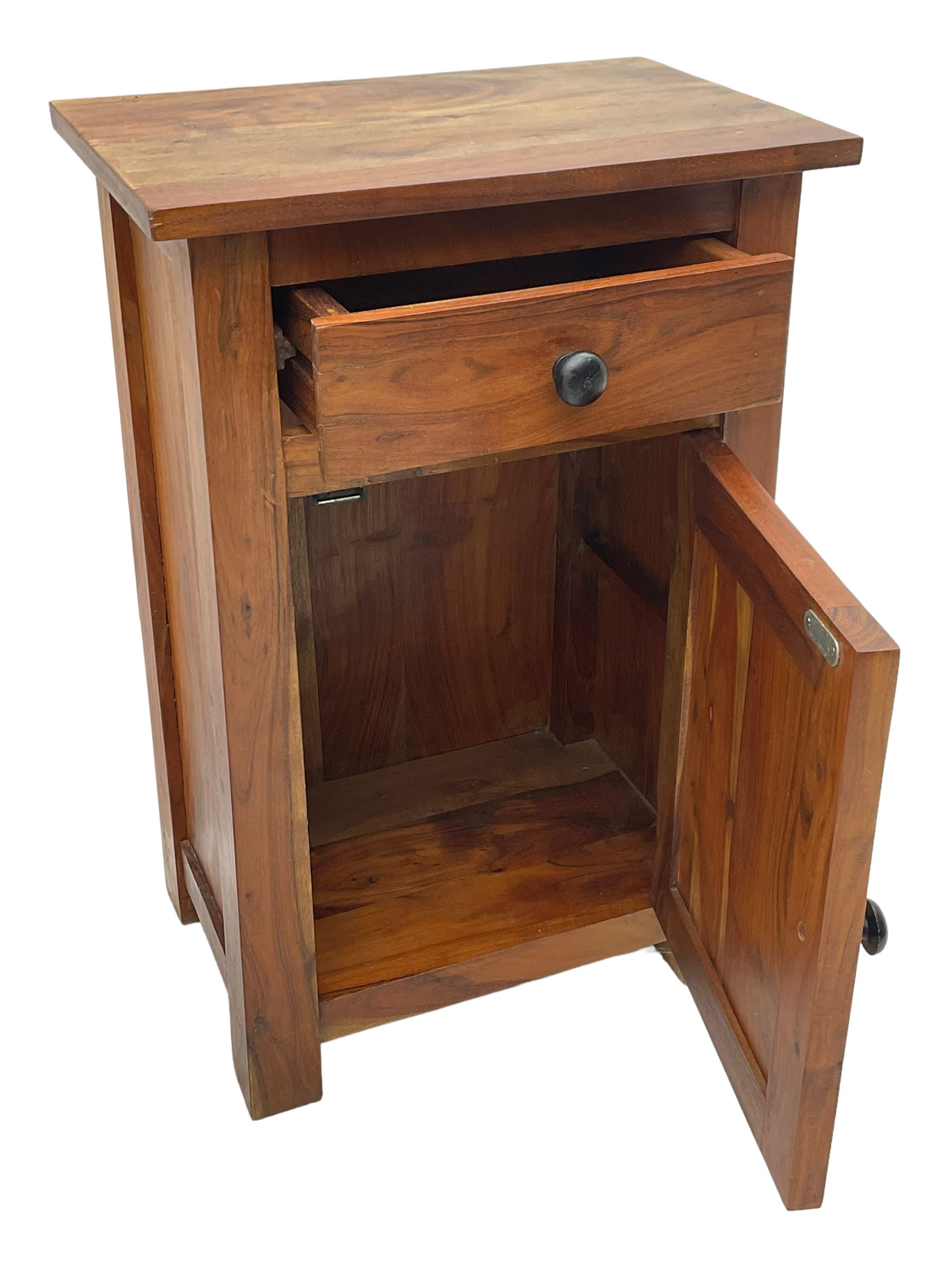 Pair of hardwood bedside cabinets, fitted with single drawer over panelled cupboard 