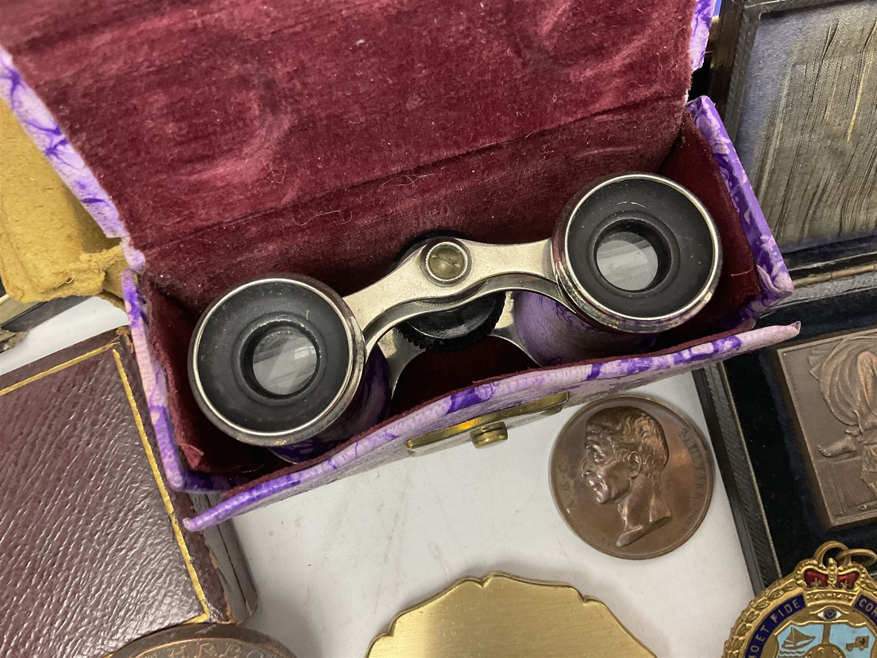 Collection of compact mirrors, including Stratton and Majestic examples, together with four pairs of opera glasses, Masonic jewels, etc