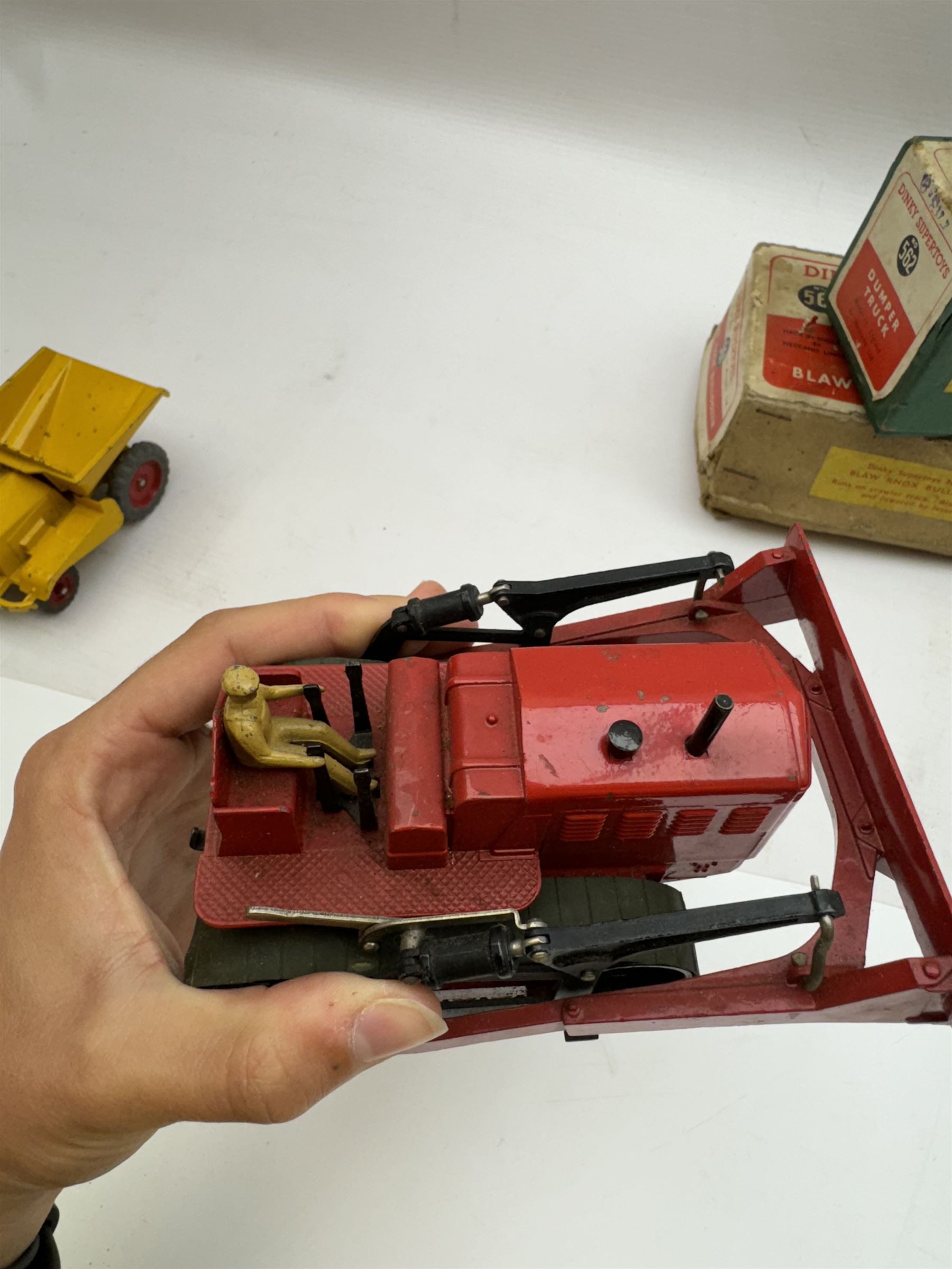 Two Dinky Supertoys models, comprising Blaw Knox Bulldozer no. 561 and Dumper Truck no. 562, both boxed 