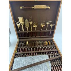 Wooden cased six place Thai gilt metal canteen of cutlery, together with additional matching flatware 