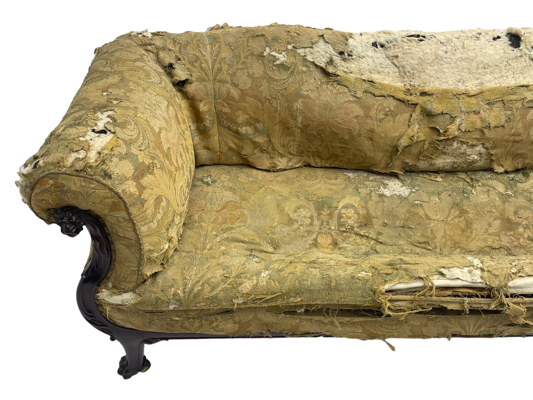 19th century mahogany settee, rolled S-scrolled arms carved with lion masks and acanthus leaf scrolls, the lower moulded rail carved with scrolling design, raised on carved paw feet with recessed brass and ceramic castors 