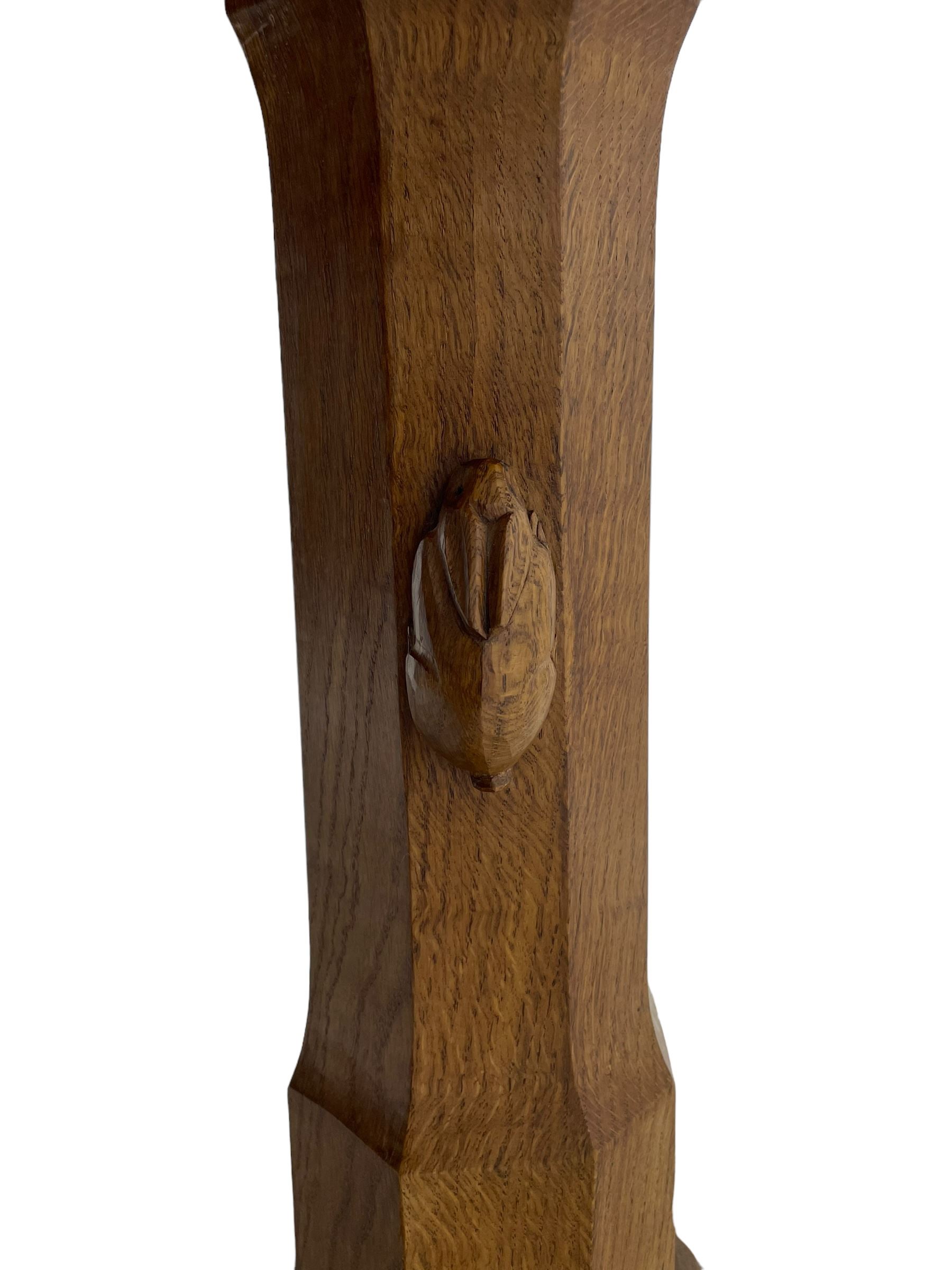 Rabbitman - oak dining table, rectangular adzed top, twin octagonal pillar supports on sledge feet, united by floor stretcher, carved with rabbit signature, by Peter Heap of Wetwang 