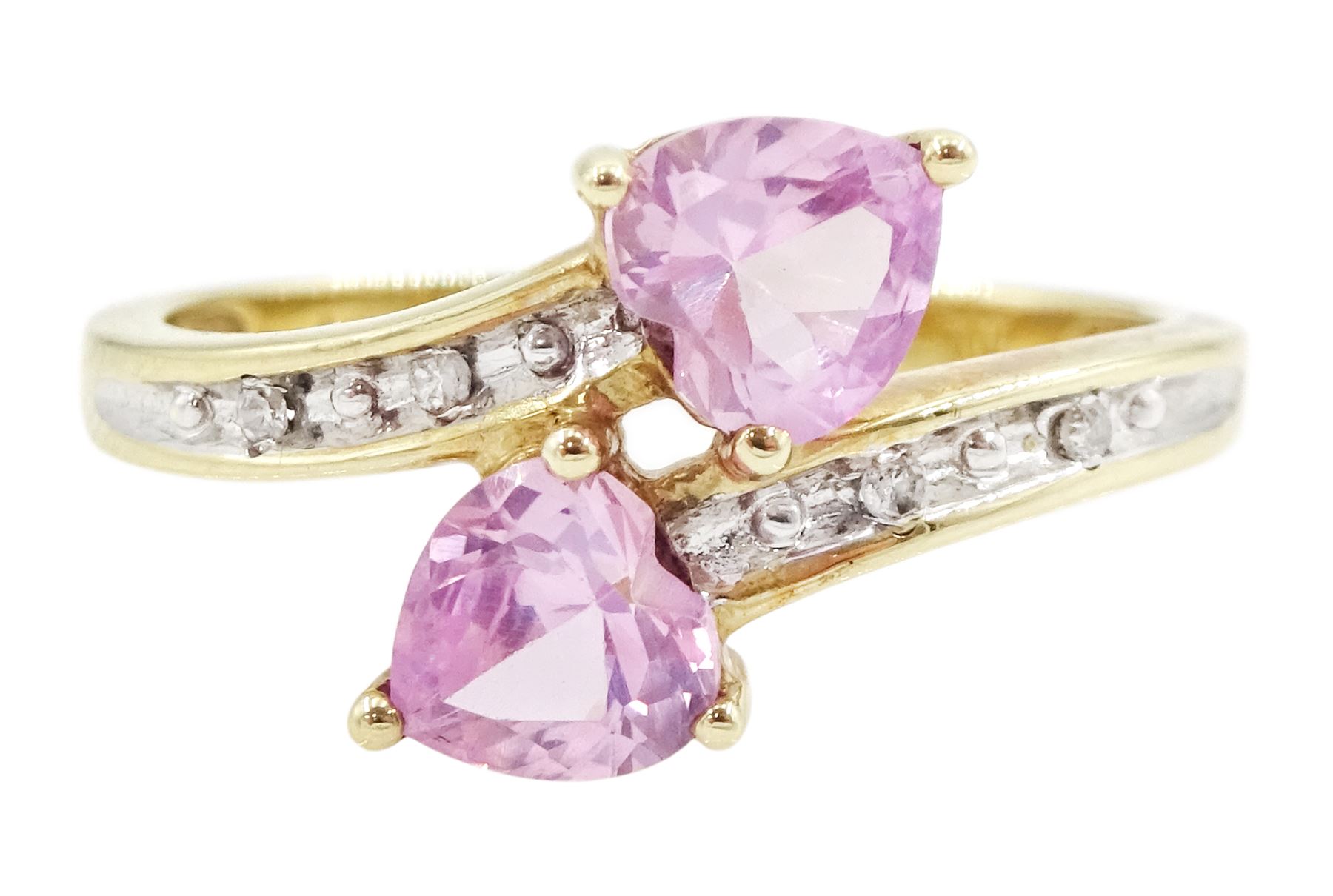 9ct gold two stone heart cut pink sapphire ring, with diamond set shoulders, hallmarked