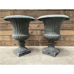 Pair of Victorian design cast iron garden urns, antique copper finish, egg and dart decoration