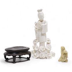 Chinese blanc de Chine figure of Guanyin, wearing robes and standing upon a lotus base, H2...